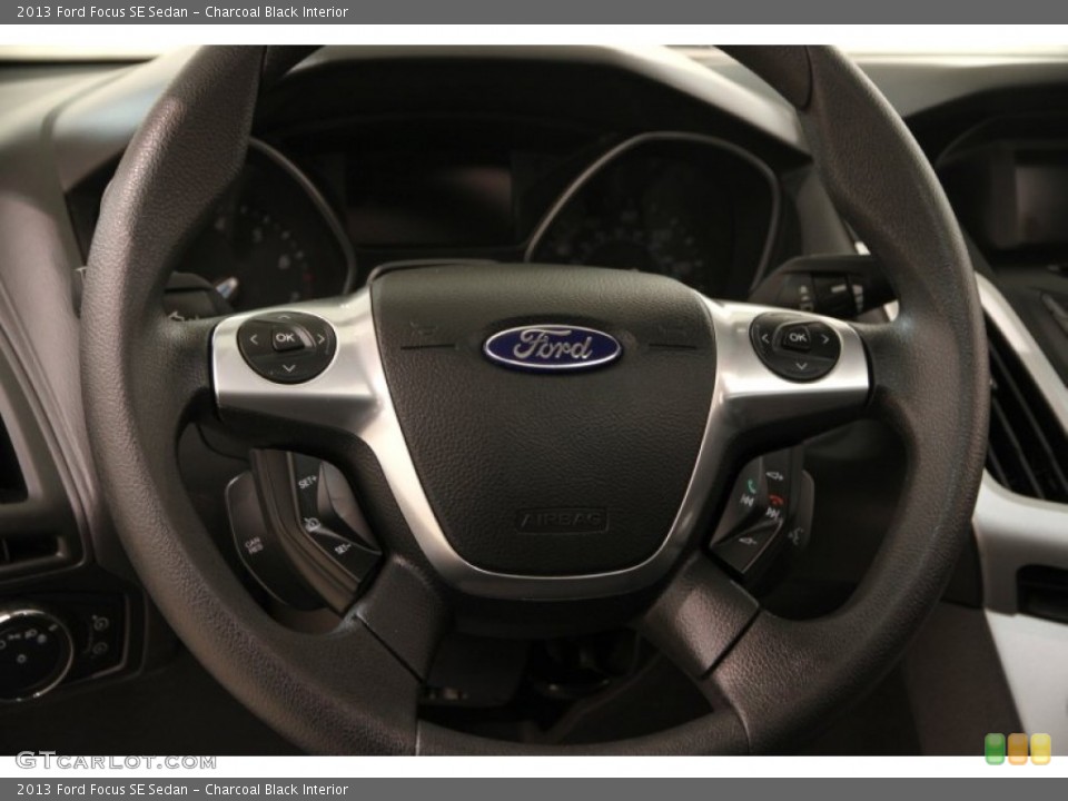 Charcoal Black Interior Steering Wheel for the 2013 Ford Focus SE Sedan #103033791