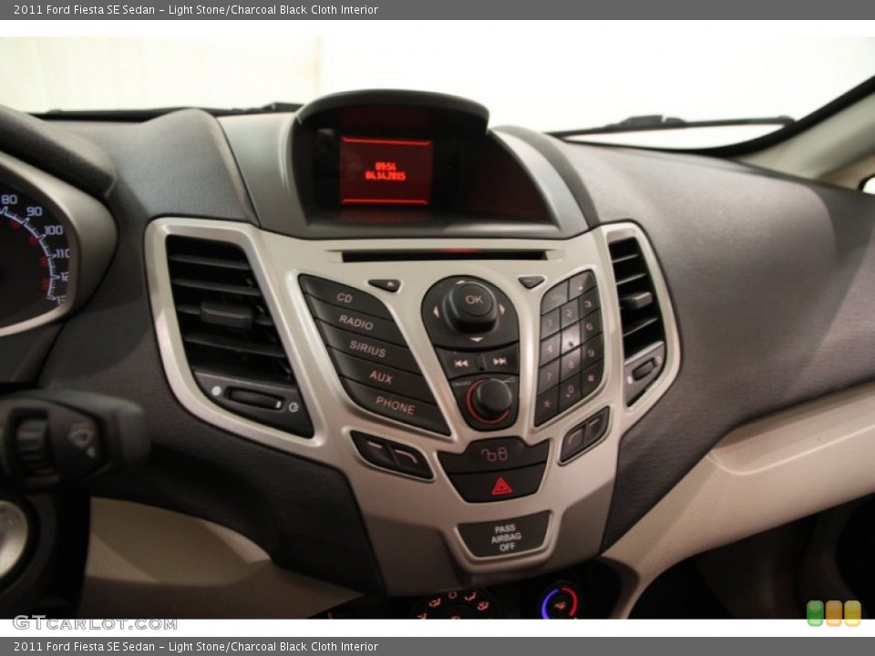 Light Stone/Charcoal Black Cloth Interior Controls for the 2011 Ford Fiesta SE Sedan #103067292