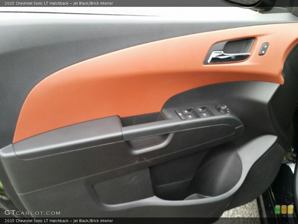 Jet Black/Brick Interior Door Panel for the 2015 Chevrolet Sonic LT Hatchback #103073376