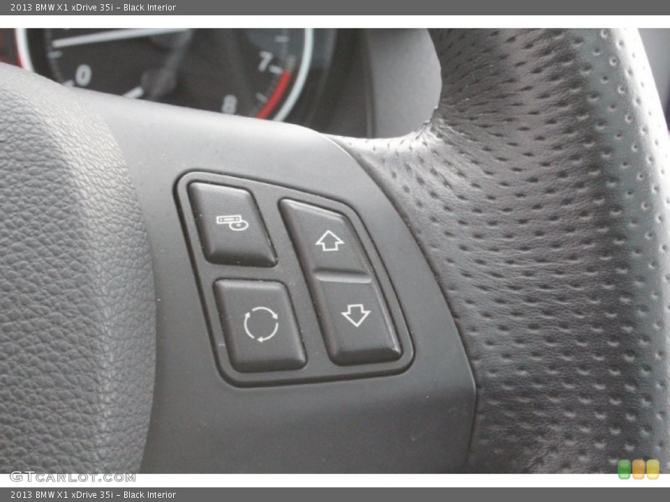 Black Interior Controls for the 2013 BMW X1 xDrive 35i #103109072