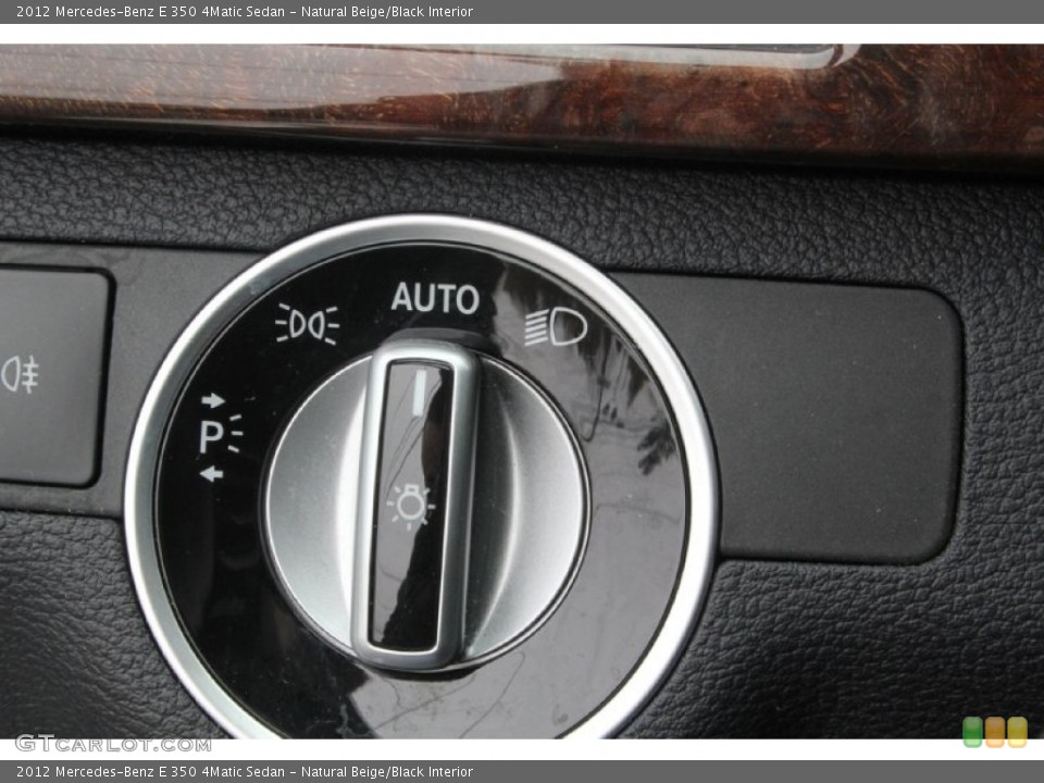 Natural Beige/Black Interior Controls for the 2012 Mercedes-Benz E 350 4Matic Sedan #103118665