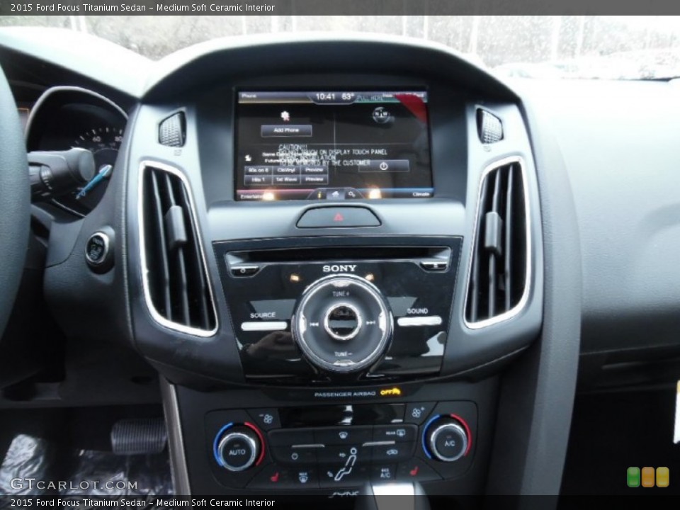 Medium Soft Ceramic Interior Controls for the 2015 Ford Focus Titanium Sedan #103194370