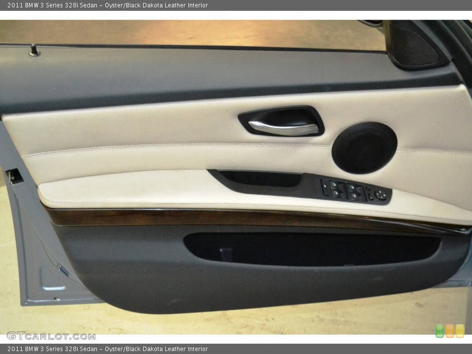 Oyster/Black Dakota Leather Interior Door Panel for the 2011 BMW 3 Series 328i Sedan #103229497
