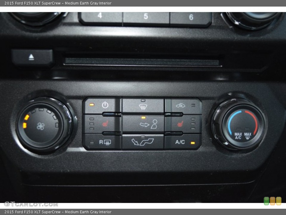 Medium Earth Gray Interior Controls for the 2015 Ford F150 XLT SuperCrew #103286875