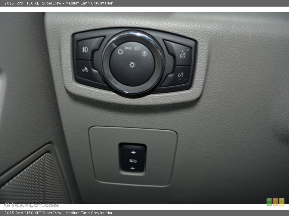 Medium Earth Gray Interior Controls for the 2015 Ford F150 XLT SuperCrew #103287037