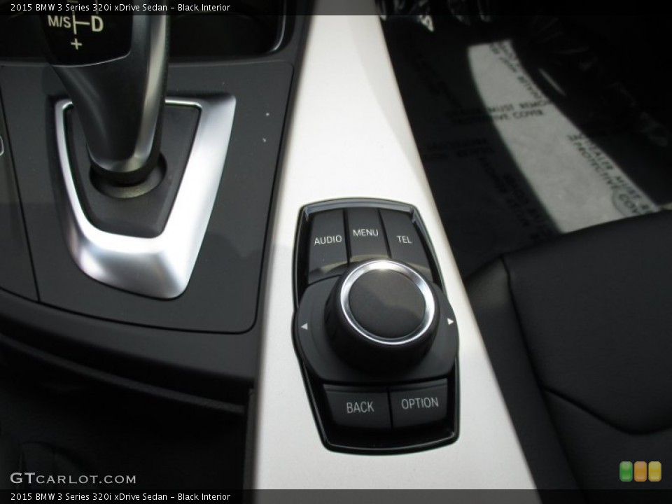 Black Interior Controls for the 2015 BMW 3 Series 320i xDrive Sedan #103296679
