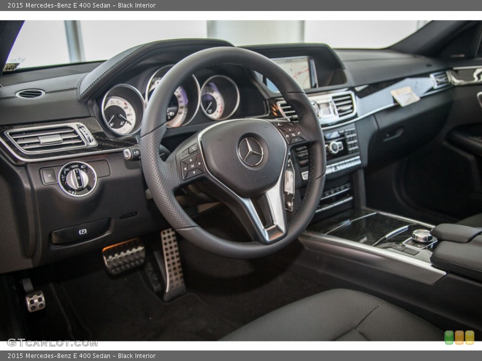 Black Interior Dashboard for the 2015 Mercedes-Benz E 400 Sedan #103303402