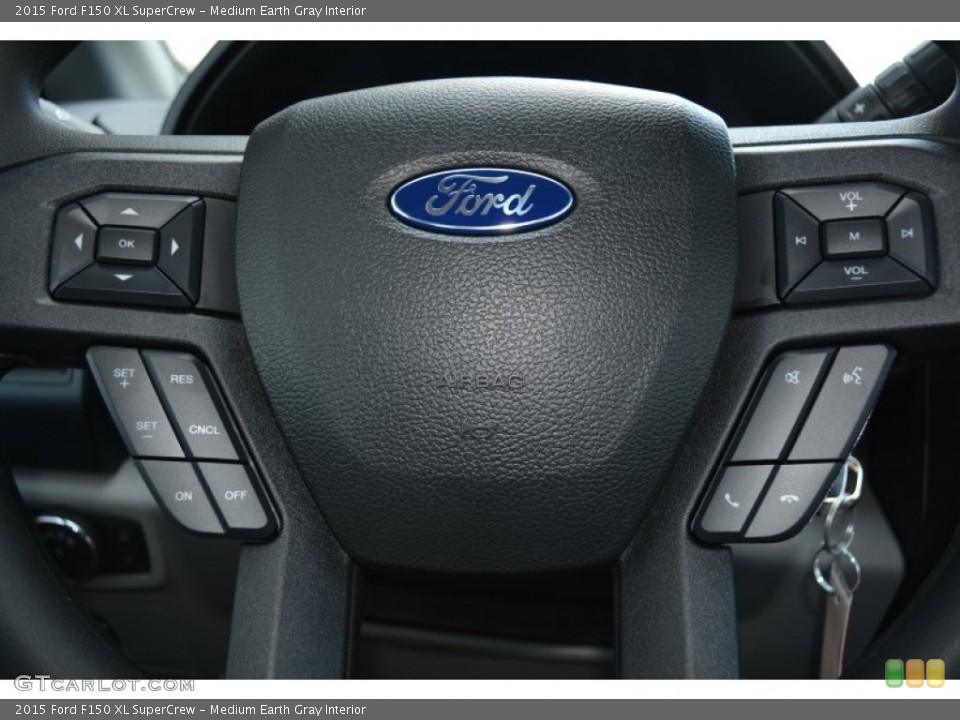 Medium Earth Gray Interior Steering Wheel for the 2015 Ford F150 XL SuperCrew #103328477