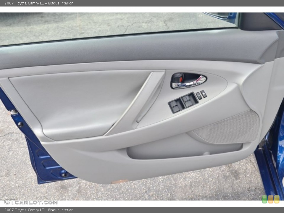 Bisque Interior Door Panel for the 2007 Toyota Camry LE #103348080