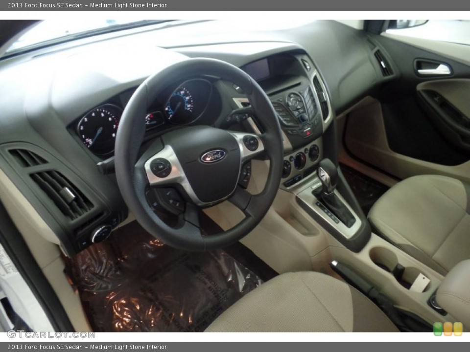Medium Light Stone Interior Prime Interior for the 2013 Ford Focus SE Sedan #103365171