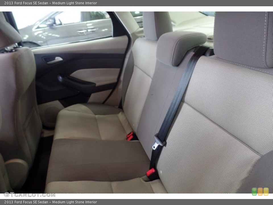 Medium Light Stone Interior Rear Seat for the 2013 Ford Focus SE Sedan #103365207