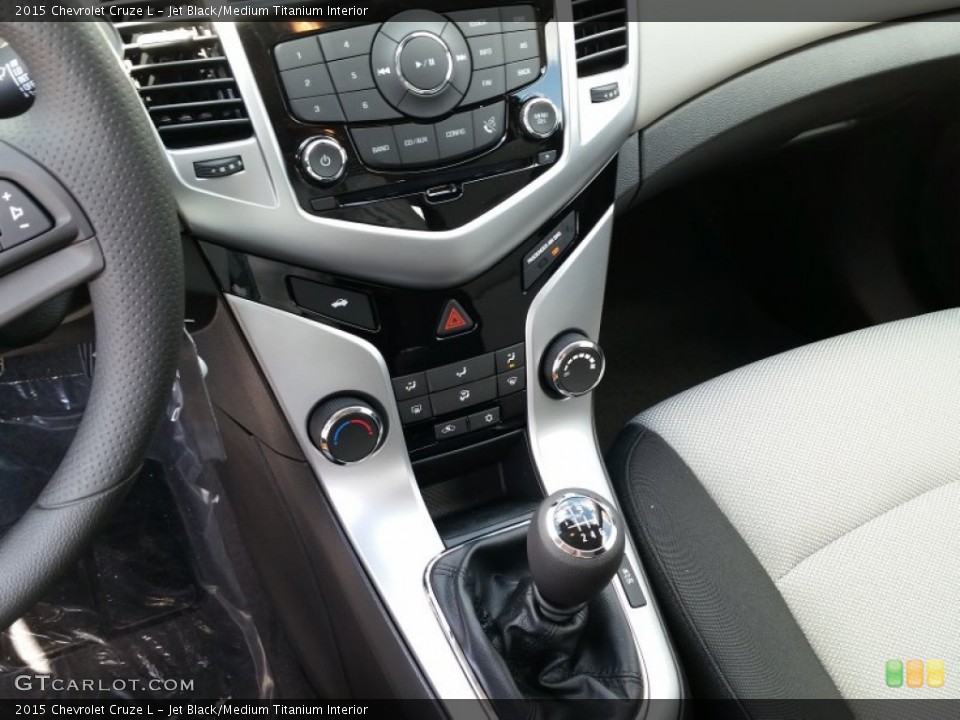 Jet Black/Medium Titanium Interior Controls for the 2015 Chevrolet Cruze L #103409401