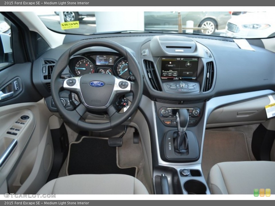 Medium Light Stone Interior Dashboard for the 2015 Ford Escape SE #103421425