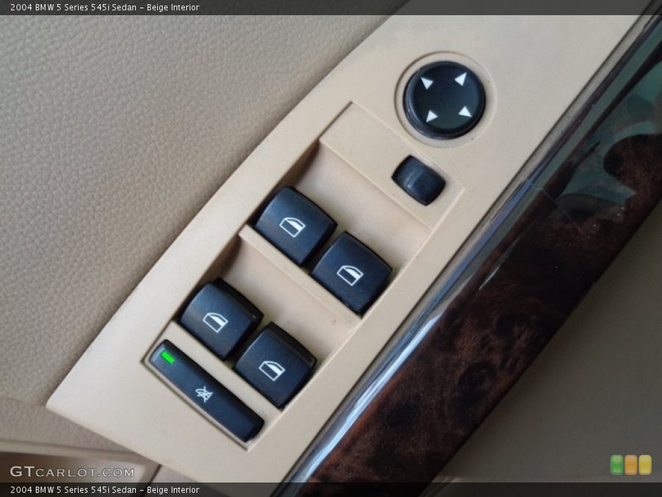 Beige Interior Controls for the 2004 BMW 5 Series 545i Sedan #103439244