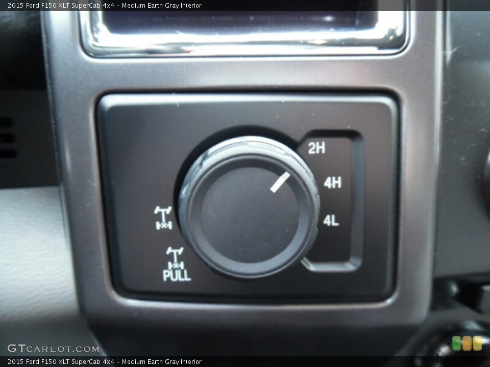 Medium Earth Gray Interior Controls for the 2015 Ford F150 XLT SuperCab 4x4 #103503578