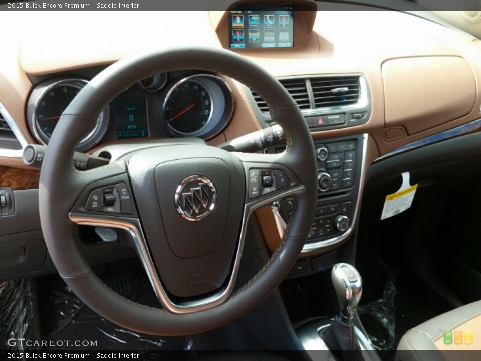 Saddle Interior Dashboard for the 2015 Buick Encore Premium #103515926