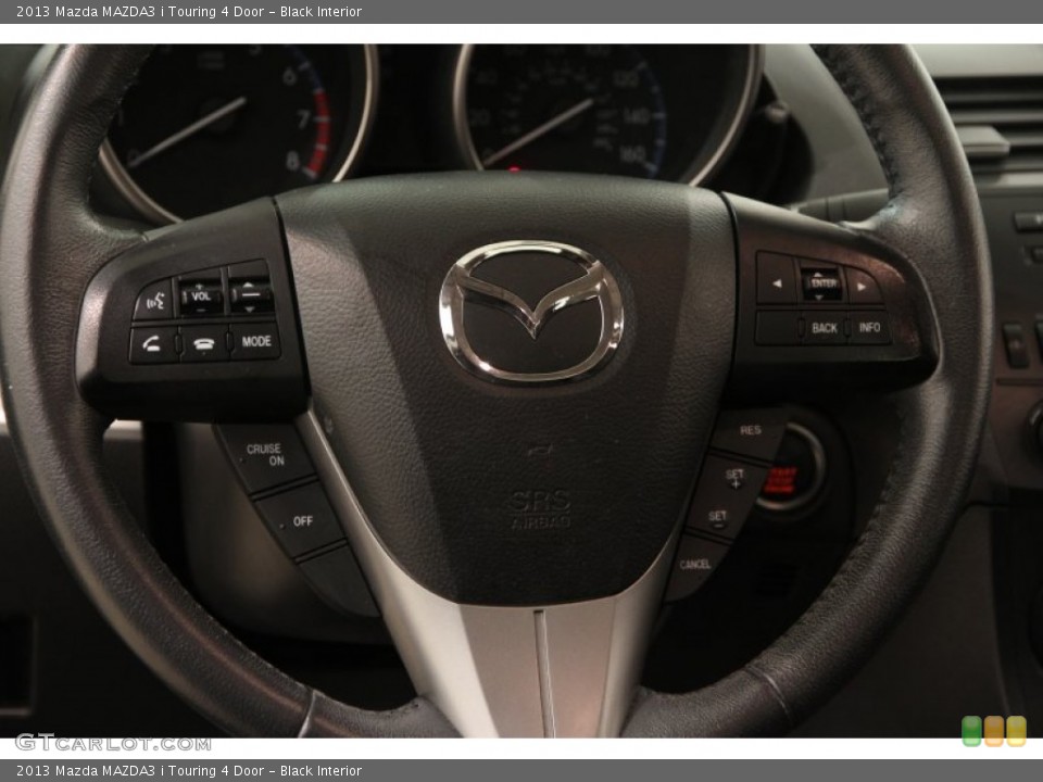Black Interior Steering Wheel for the 2013 Mazda MAZDA3 i Touring 4 Door #103539212