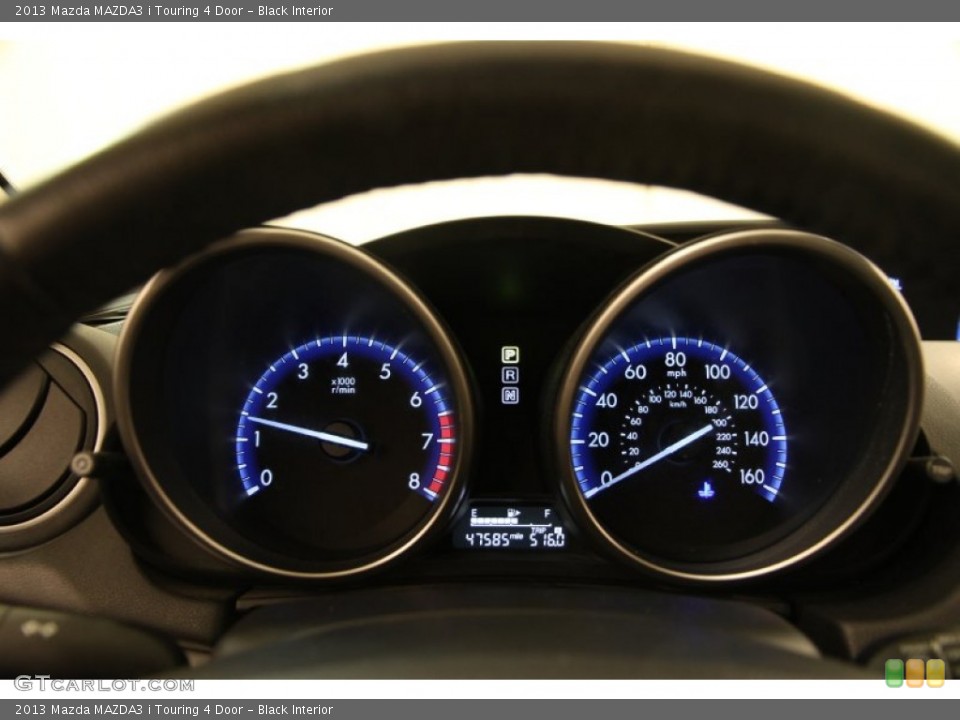 Black Interior Gauges for the 2013 Mazda MAZDA3 i Touring 4 Door #103539233