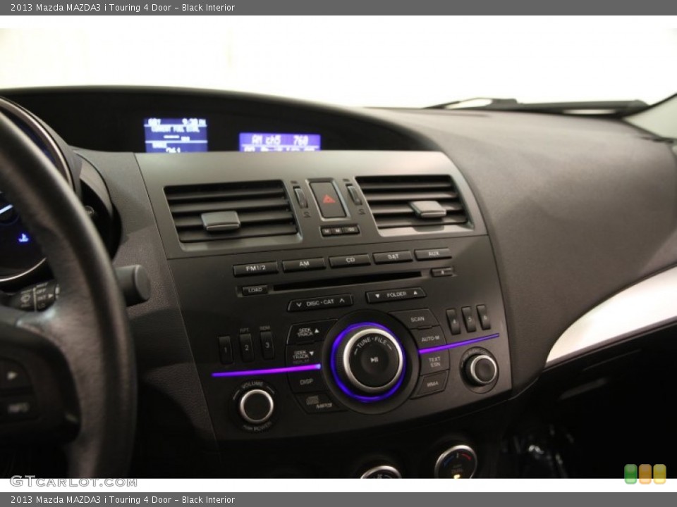 Black Interior Controls for the 2013 Mazda MAZDA3 i Touring 4 Door #103539251