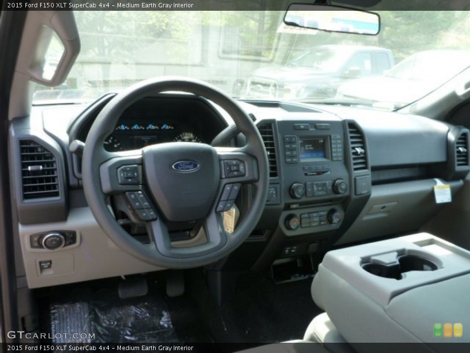 Medium Earth Gray Interior Dashboard for the 2015 Ford F150 XLT SuperCab 4x4 #103693584