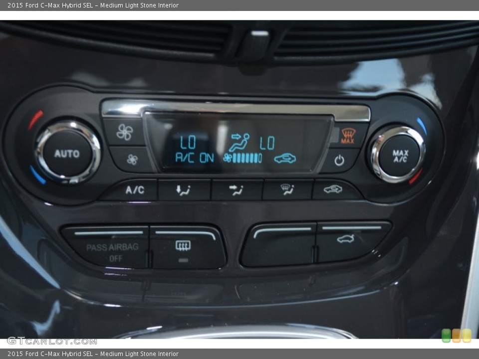 Medium Light Stone Interior Controls for the 2015 Ford C-Max Hybrid SEL #103874562