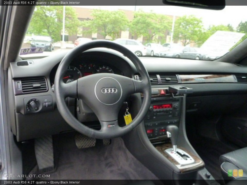 Ebony Black Interior Dashboard for the 2003 Audi RS6 4.2T quattro #104098606