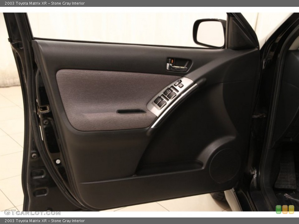 Stone Gray Interior Door Panel for the 2003 Toyota Matrix XR #104154409