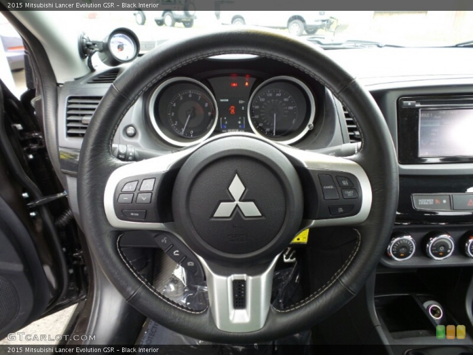 Black Interior Steering Wheel for the 2015 Mitsubishi Lancer Evolution GSR #104396070