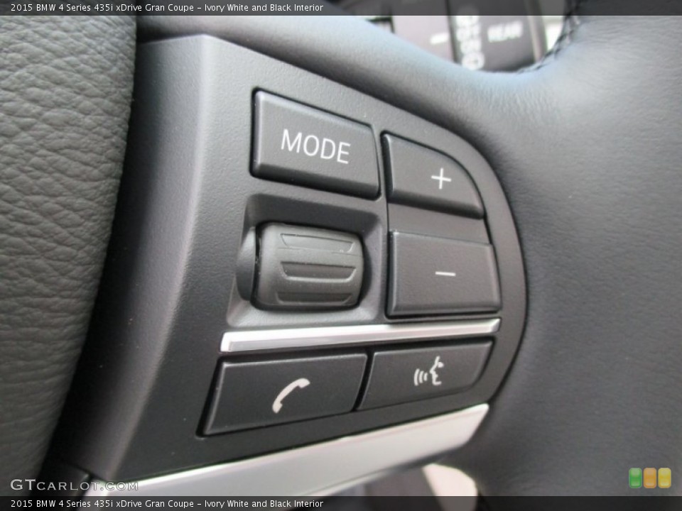 Ivory White and Black Interior Controls for the 2015 BMW 4 Series 435i xDrive Gran Coupe #104488008