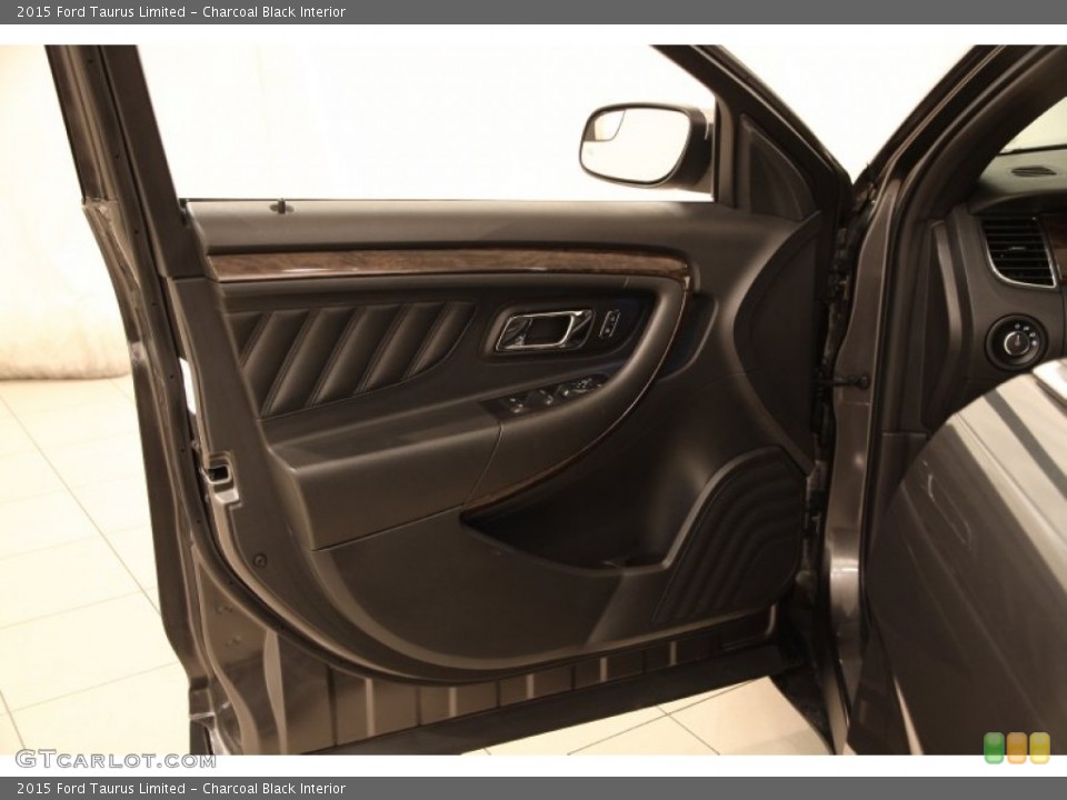 Charcoal Black Interior Door Panel for the 2015 Ford Taurus Limited #104614385