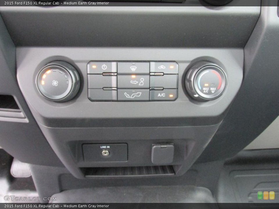 Medium Earth Gray Interior Controls for the 2015 Ford F150 XL Regular Cab #104784072