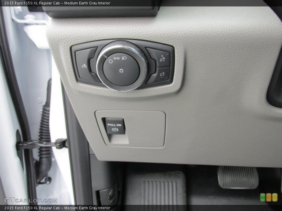 Medium Earth Gray Interior Controls for the 2015 Ford F150 XL Regular Cab #104784139