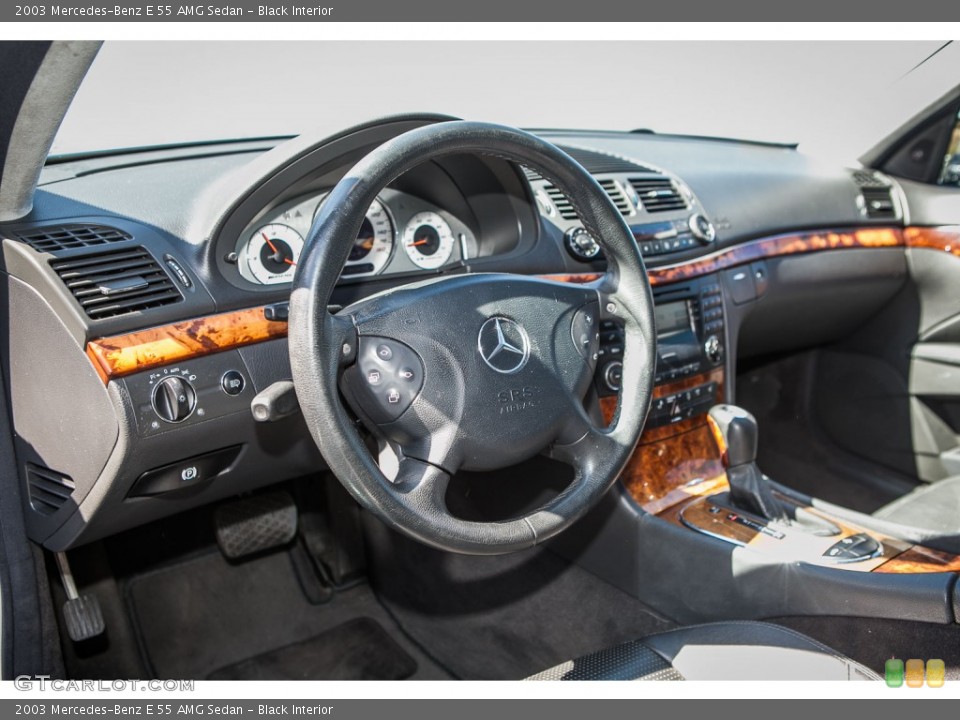 Black Interior Dashboard for the 2003 Mercedes-Benz E 55 AMG Sedan #104841308