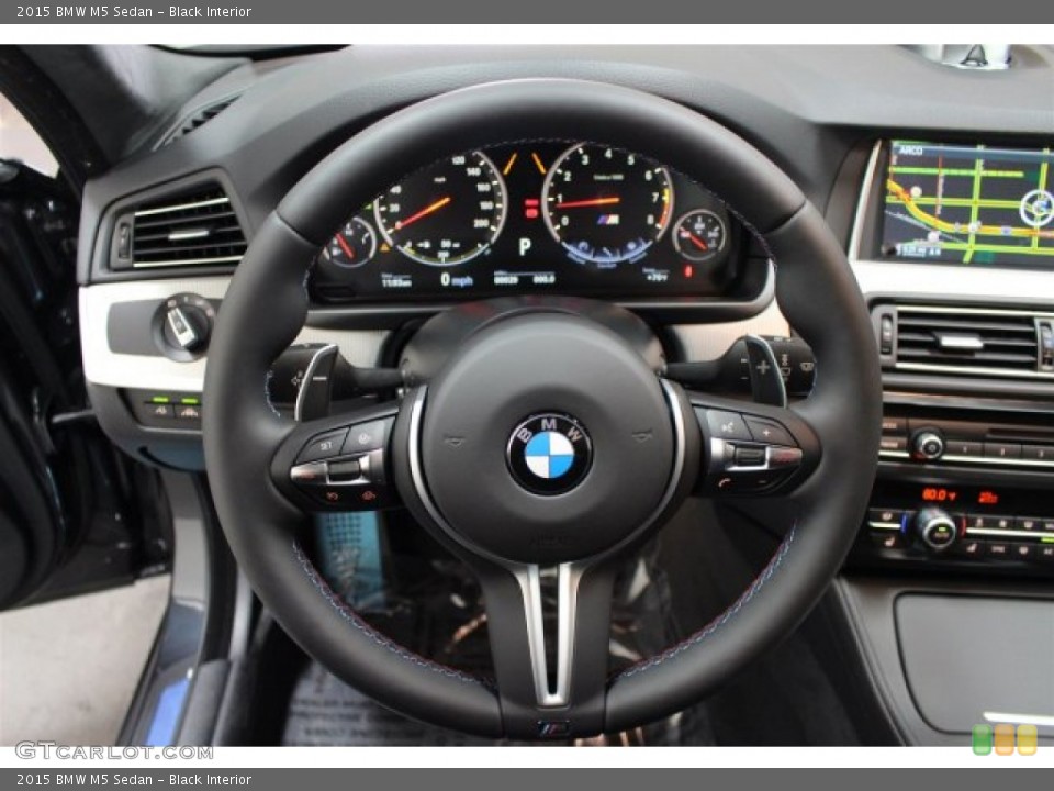 Black Interior Steering Wheel for the 2015 BMW M5 Sedan #104857811