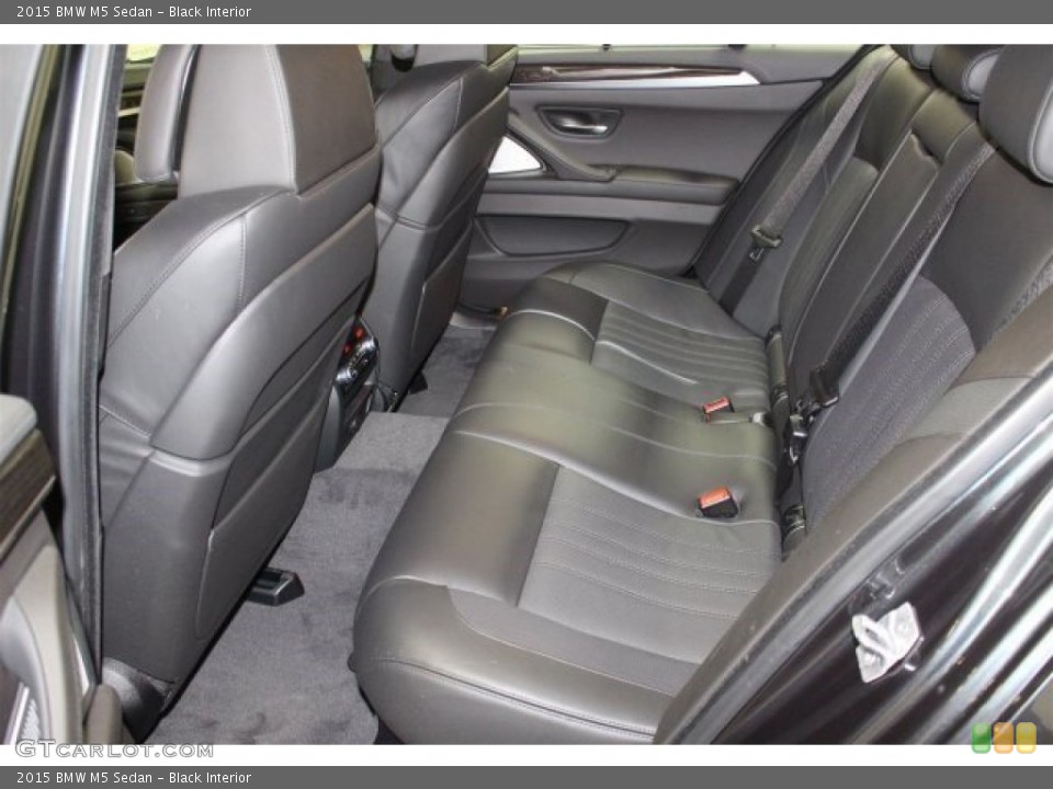 Black Interior Rear Seat for the 2015 BMW M5 Sedan #105134404
