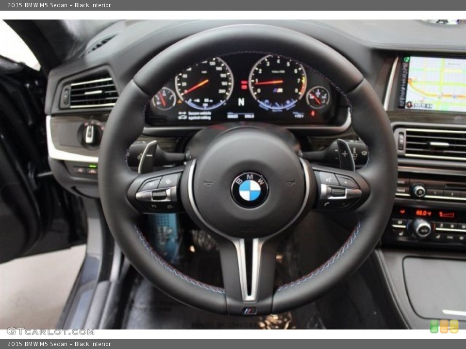 Black Interior Steering Wheel for the 2015 BMW M5 Sedan #105134446