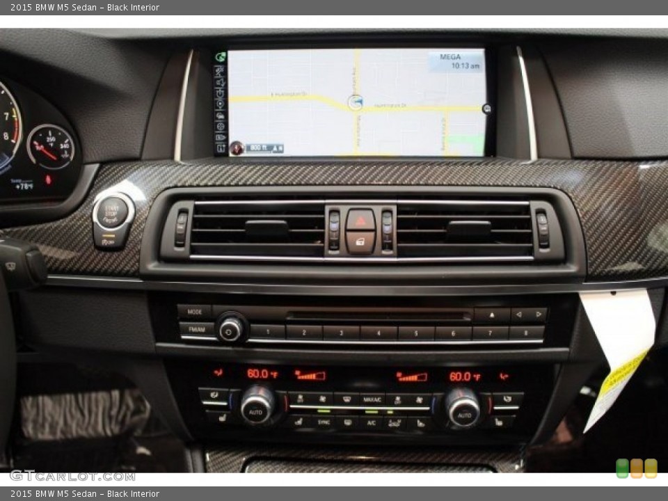 Black Interior Controls for the 2015 BMW M5 Sedan #105134482