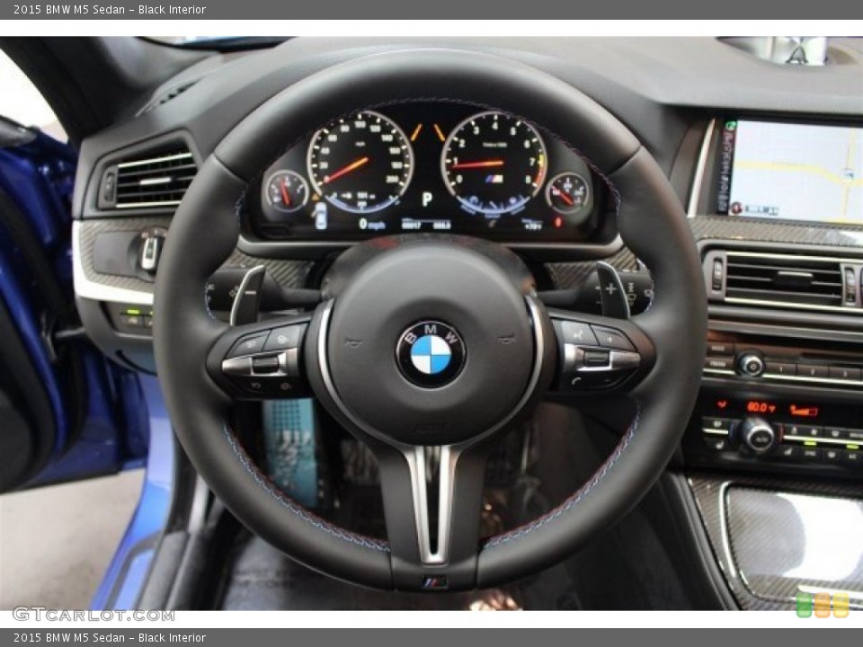 Black Interior Steering Wheel for the 2015 BMW M5 Sedan #105134488