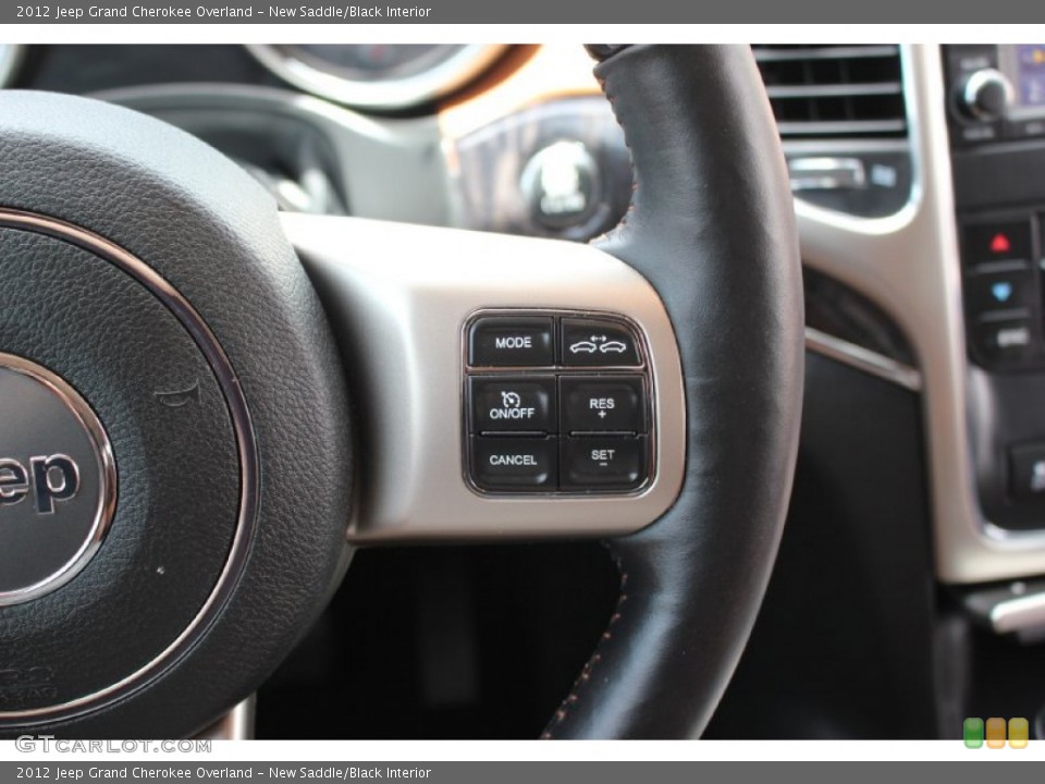 New Saddle/Black Interior Controls for the 2012 Jeep Grand Cherokee Overland #105173694