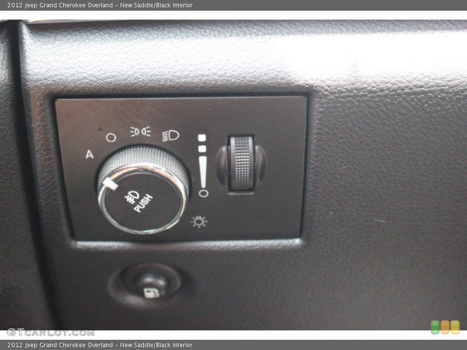 New Saddle/Black Interior Controls for the 2012 Jeep Grand Cherokee Overland #105173733