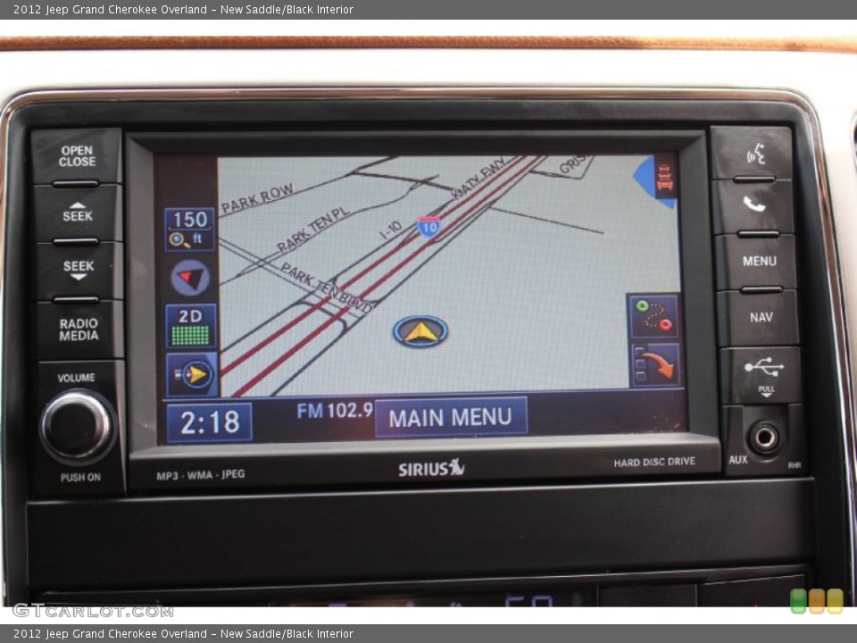 New Saddle/Black Interior Navigation for the 2012 Jeep Grand Cherokee Overland #105173751