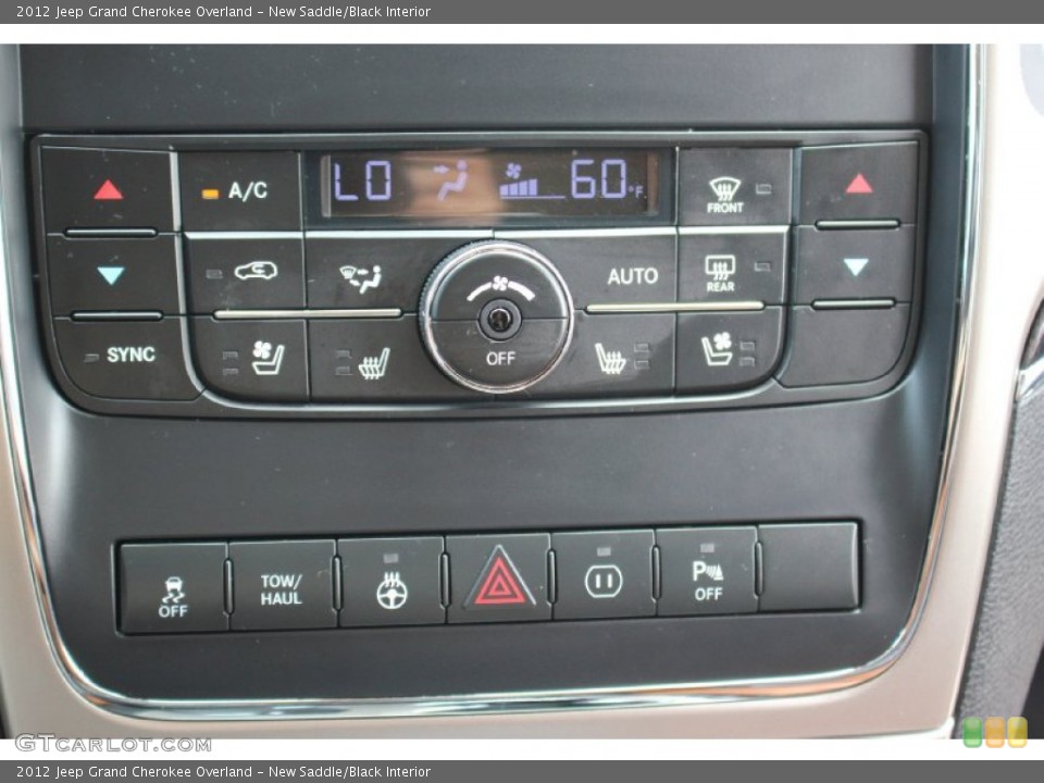 New Saddle/Black Interior Controls for the 2012 Jeep Grand Cherokee Overland #105173755