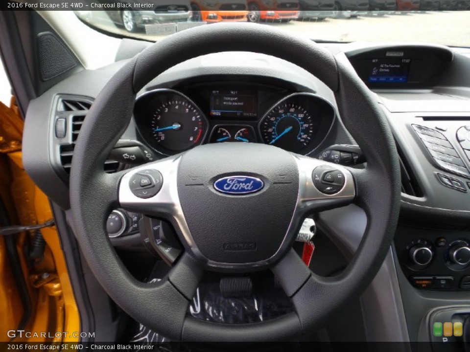 Charcoal Black Interior Steering Wheel for the 2016 Ford Escape SE 4WD #105299216