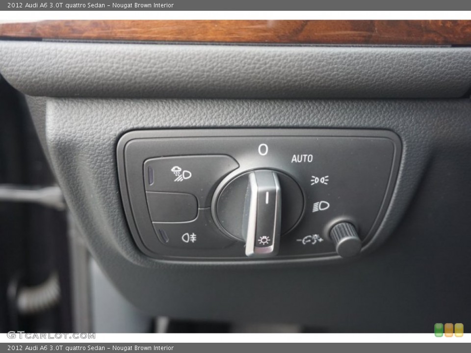 Nougat Brown Interior Controls for the 2012 Audi A6 3.0T quattro Sedan #105339657