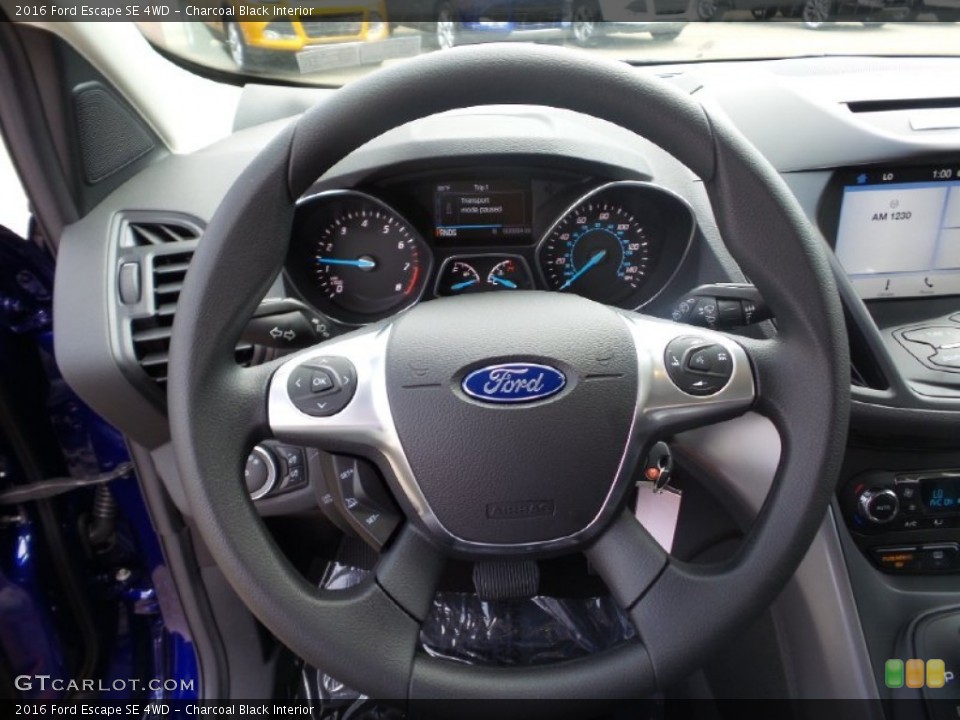 Charcoal Black Interior Steering Wheel for the 2016 Ford Escape SE 4WD #105525233
