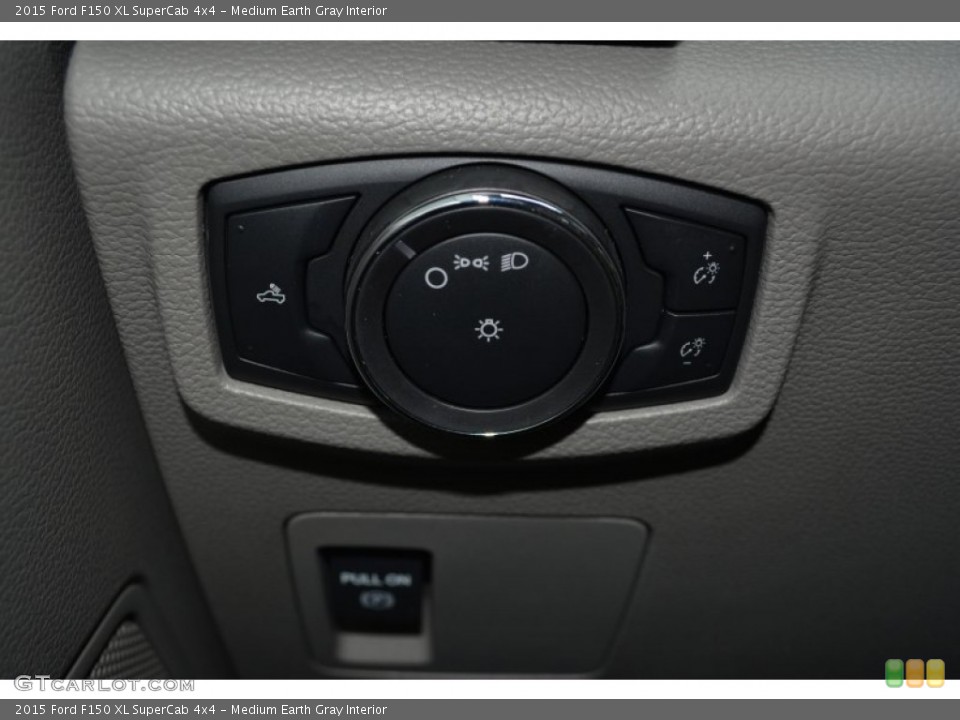 Medium Earth Gray Interior Controls for the 2015 Ford F150 XL SuperCab 4x4 #105562482