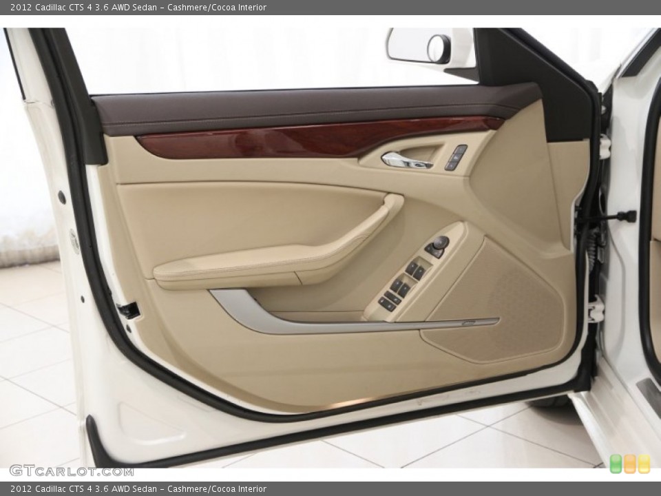 Cashmere/Cocoa Interior Door Panel for the 2012 Cadillac CTS 4 3.6 AWD Sedan #105627370
