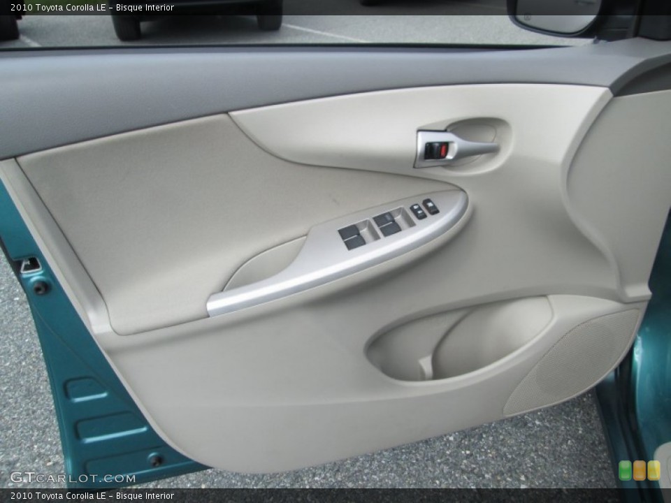 Bisque Interior Door Panel for the 2010 Toyota Corolla LE #105705115