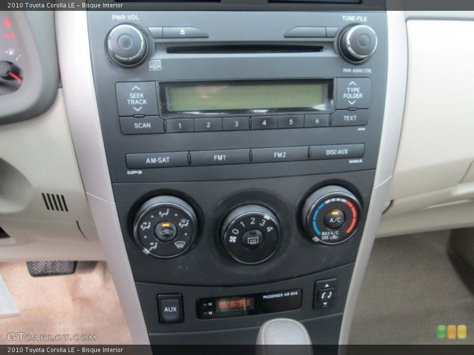 Bisque Interior Controls for the 2010 Toyota Corolla LE #105705461