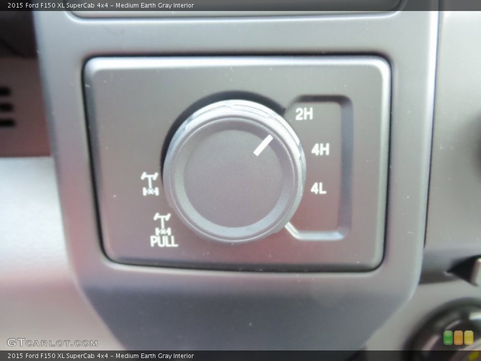 Medium Earth Gray Interior Controls for the 2015 Ford F150 XL SuperCab 4x4 #106096285